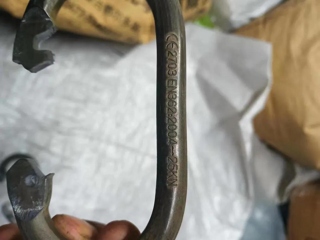 Close-up view of the deep knurling on the screw-lock sleeve of the alloy steel carabiner